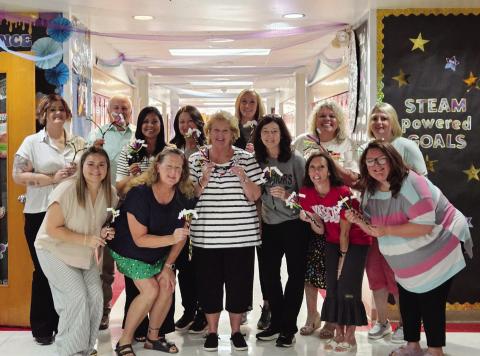 Maysville Elementary School Team shows off their Reading Rope models made during a training from the Oklahoma Literacy Initiative. Pictured, from left, front: Maggie Shannon, Susan Green, Kendra Schenk (OLI Consultant), Kimberly Layton, Mandy Russell, Kelsey Ring; back: Kevan Fortney, Principal John Edwards, Kortney McCaskill, Jennifer Nimmo, Kacee Uhles, Mandee Anderson and Jessica Dean. Courtesy Photo