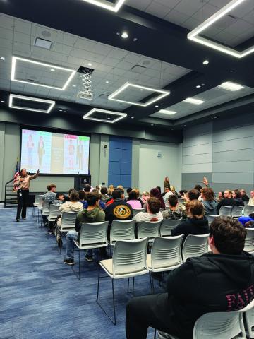 Toni Gay of Coffeyville Resources’ Wynnewood Refining Company talks with Mid-America Technology Center first-year students about what to wear to a job interview during the “Resume to Rockstar” session at Advantage Day Oct. 15. Photo courtesy of Mid-America Technology Center