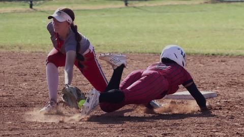 Kaisyn White slides past the tag of the Cache second baseman during the Lady Panthers’ game Monday at home. Photo by Mike Arie