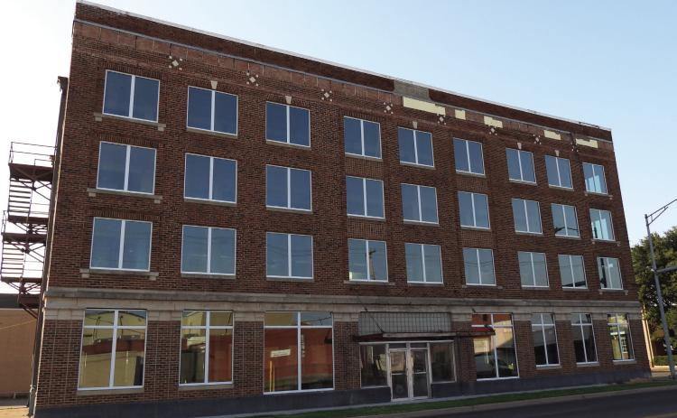 New windows are part of ongoing renovations to the historic Moody Hotel building in Pauls Valley. The 1923 building will eventually be the new home of a local accounting firm and private office space for rent. News Star photo by Chris Mackey