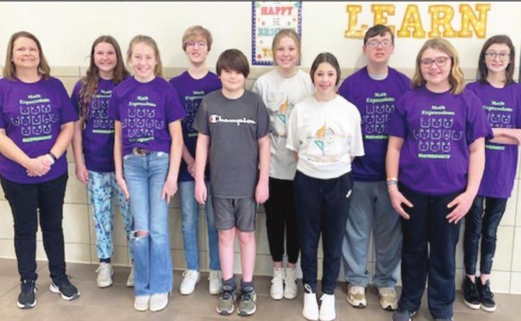 MATHCOUNTS members, left to right, include Coach Ann Harrel, seventh-grader Emma Reames, sixth-grader Sofie Ille, seventh-grader Corrie Schilling, seventh-grader James Speerbrecher, eighth-grader Karli Meadows, eighth-grader Jyntree Patterson, seventh-grader Sylas Harrell, seventh-grader Harli Johnson and sixth-grader Zanna Loriss. Not pictured are seventh-grader Tyler Casey and sixth-grader Jesse Richey. Photo courtesy of Jennifer Earp, M. Ed.