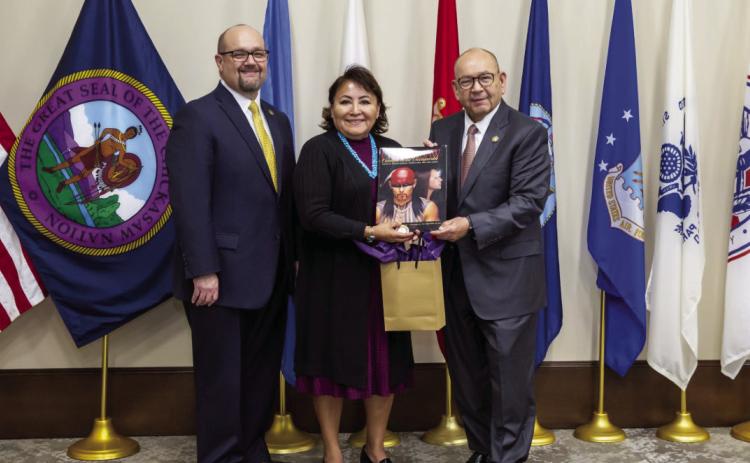 Chickasaw Nation Lt. Governor Chris Anoatubby (left) and Governor Bill Anoatubby (right) welcome Indian Health Service Director Roselyn Tso during her recent visit to Ada.