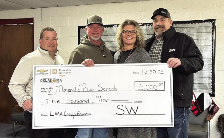 Seth Wadley Chevrolet recently awarded Maysville Public School with $5,000 as part of Chevy’s Educator Appreciation program. The funds will be used to support the purchase of new playground equipment at the elementary school. Pictured left to right: David Klein, Maysville school board vice-president and Seth Wadley Chevrolet parts department manager; Greg McKiddy, Seth Wadley Chevrolet general manager; Shelly Beach, Maysville superintendent; and John Cole, Seth Wadley outside sales. Courtesy Photo