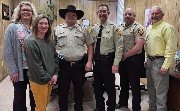 Maysville Schools welcomed a new school resource officer, Deputy Greg Lindsey, to the district last week thanks to a partnership with the Garvin County Sheriff's Office and funding from a Stronger Connections Grant through the Oklahoma State Department of Education. Pictured left to right are Maysville Superintendent Shelly Beach, Secondary Principal Krysti Kesler, Deputy Greg Lindsey, Sheriff Jim Mullett, Undersheriff James Richardson and Elementary Principal John Edwards. News Star photo by Suzanne Mackey