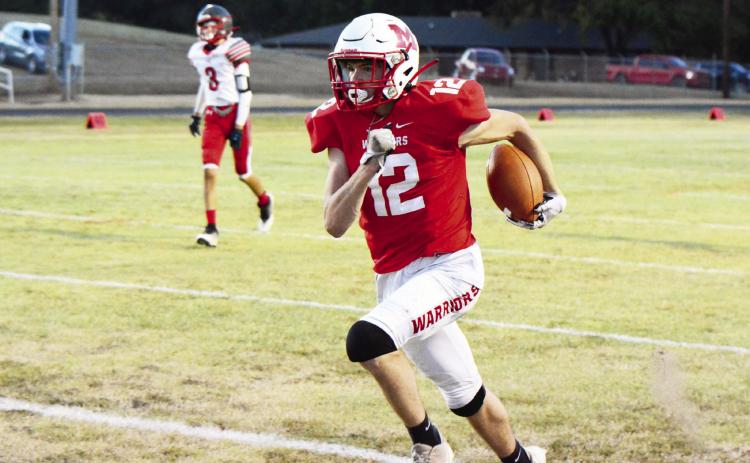 Maysville's James McGregor shows his speed as he outruns the Fox defender in Maysville's 52-6 win Friday night. Photo courtesy of Denny Park