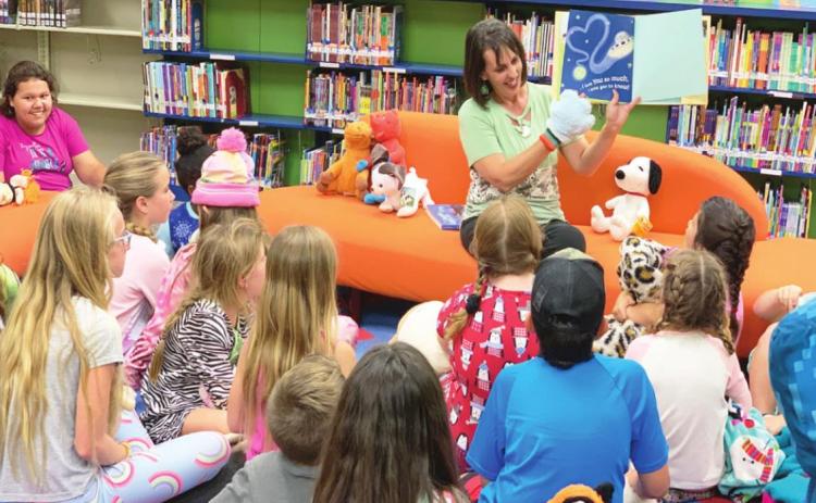 Children attending the “Tails and Tales” Summer Reading Program at Chandler-Watts Memorial Library in Stratford treated their own stuffed animals to a library slumber party. After an evening story time, the kids went home, but left their stuffed animals at the library to enjoy the party. Courtesy photo