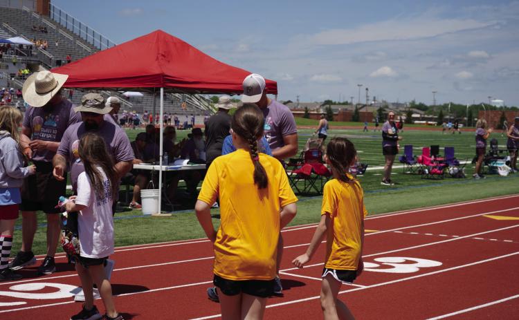 REC employees Jacob Trammell, Brandon McCaskill, and Justin Jones volunteered at the 2023 Special Olympics Oklahoma State Games along with the other 147 co-op volunteers across the state. Courtesy photo.
