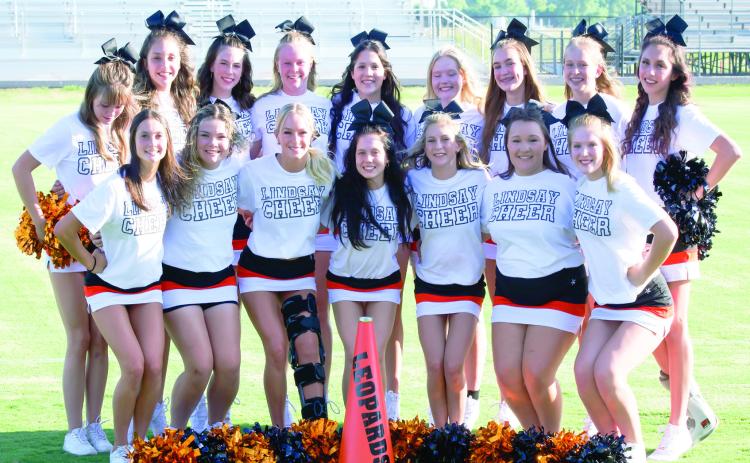 The Lindsay cheer squad took time out to pose for a group photo during Friday night's Meet the Leopards event. Photo by Kristy Schrader