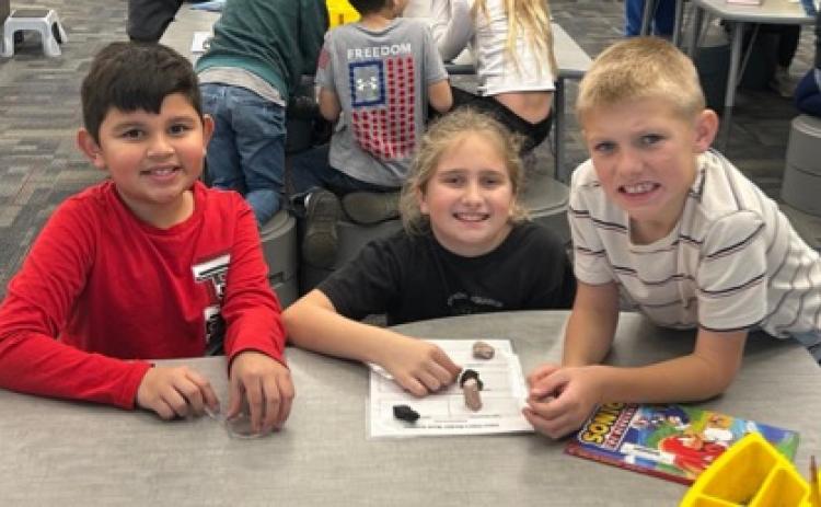 Second and third grade students at Pauls Valley Elementary School recently had the opportunity to conduct a hands-on investigation of different types of rocks. The lesson was part of a geology curriculum funded by a grant from the Pauls Valley Foundation for Academic Excellence. Courtesy photo