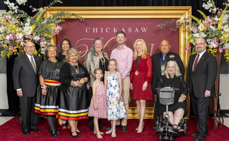 Chickasaw Nation Governor Bill Anoatubby, left, and Lt. Governor Chris Anoatubby, right, with 2025 Chickasaw Hall of Fame inductees and their families. From left: Gina Brown, Lisa John, LaDonna Brown, Susan Woods, Molly Hansen, Brooke Hansen, Michael Hansen, Tobi Merritt Edwards Young, Michael Keith Crossley and ‘Rena Bell Duncan.
