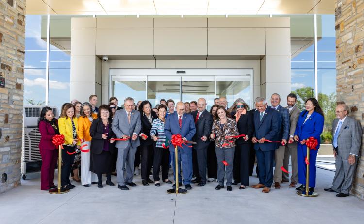 Chickasaw Nation Governor Bill Anoatubby, center, and Lt. Governor Chris Anoatubby are joined by tribal elected officials, Chickasaw Nation Department of Health leaders and staff in dedication ceremonies June 1 for the Chickasaw Nation Integrative Medicine Clinic, 1826 Anhi Drive, on the Ada South Campus.