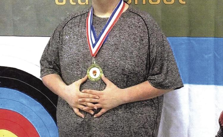 Paoli’s Chase Sumner poses with his first place medal at the Western Division state archery tournament. Courtesy Photo