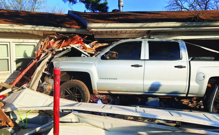 A motorist suffering a medical emergency crashed a pickup truck into a residence on State Highway 19 northeast of Pauls Valley early Tuesday morning. No one in the home was injured. The driver was transported to a local hospital for treatment. Photo courtesy of Robert Bittle