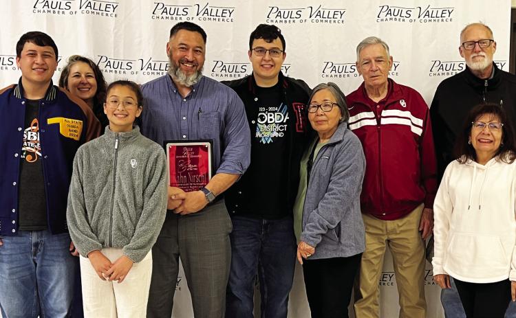 2024 Pauls Valley Citizen of the Year Kahn Nirschl (fourth from left) poses with his family after receiving the award during the Pauls Valley Chamber of Commerce Banquet April 18. News Star photo by Suzanne Mackey