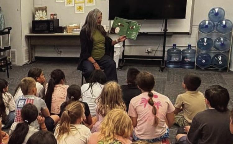 Rep. Cynthia Roe, R-Lindsay, reads to third- and fourth-grade students at Wayne Public Schools on Thursday, Sept. 10, for Read an Accurate Ag Book Week. Photo courtesy of Wayne Public Schools.