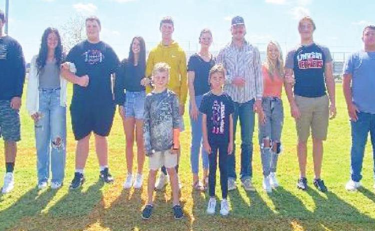 Pictured from left to Right: Senior Leopards Ely Dover and Caleb Stoll escorting Freshman candidate Tessa Inman, Junior Jacey McReynolds being escorted by Senior Leopard Sean Allgood, Senior Candidate Taryn Phillips being escorted by Senior Leopard Chad Robinson, Senior Candidate Kaylee Marcum being escorted by Senior Leopard Trace Adams, Senior Candidate Nicole Henson being escorted by Senior Leopard Dagon Harrell, and Senior Leopards Phillip Moore and Pedro Menchaca escorting Sophomore candidate Ally Beth