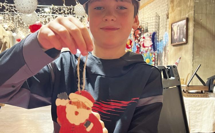 Plenty of wood ornaments were decorated at the Pauls Valley Arts Council's Christmas in the Valley event Saturday. The ornaments will also be available for decoration for $1 each at the Santa Fe Depot Museum from 6-8 p.m. Thursday nights in December as part of the city of Pauls Valley’s weekly Christmas in the Valley activities downtown. Photo Courtesy of Rita Hines