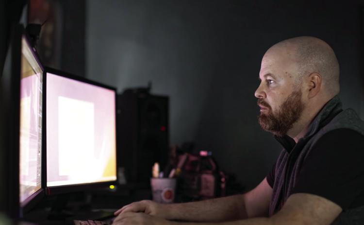 Oklahoma City filmmaker and co-owner of Boiling Point Media, Ryan Bellgardt, works on a project on April 8, 2026. (Brent Fuchs/Oklahoma City)
