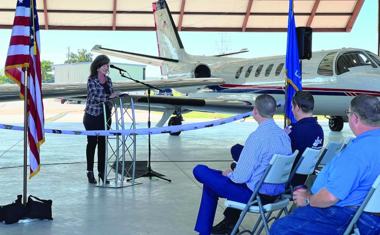 State Rep. Tammy Townley spoke to dignitaries and community members gathered at the Pauls Valley Municipal Airport Monday to celebrate the completion of a new hangar and taxiway project. News Star photo by Suzanne Mackey