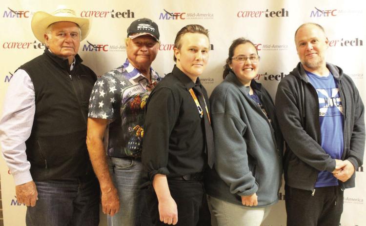 From left, Joe McGowen and Jim Webster named Derek Stewart, Elizabeth Dunn and Jacob Ginseng as the first recipients of the Oklahoma First Scholarship.