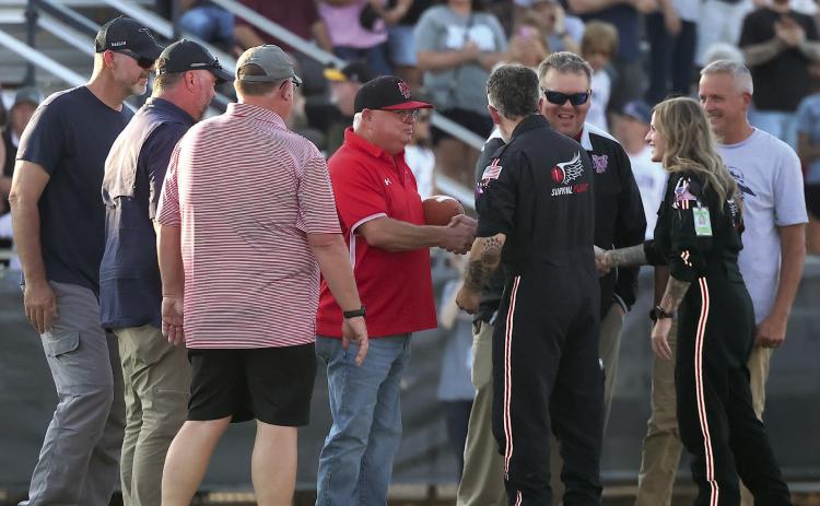 Pauls Valley Principal Kirk Moore and Assistant Principal Chad Chronister received a special game ball from the Memorial Health System of Southwestern Oklahoma Friday night. The presentation took place during a fly-in at Marlow, honoring the two men for their bravery during the school shooting earlier this year. News Star photos by Mike Arie