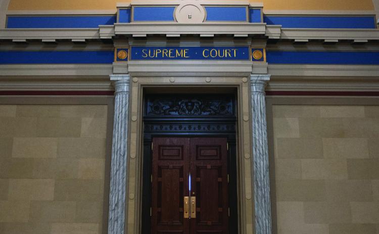 The outside doors of the Oklahoma Supreme Court chambers are seen in this file photo. Photo by Whitney Bryen of Oklahoma Watch