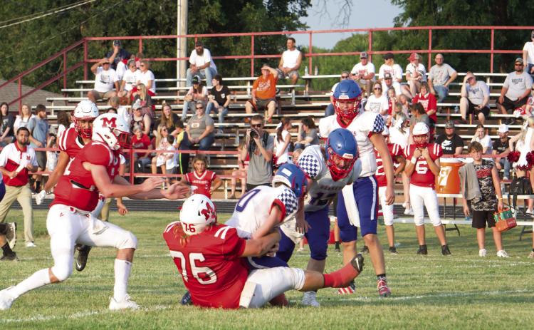 Maysville’s Brock Driscoll tackles the Bray-Doyle runningback during Friday night’s 50-0 win News Star photo by Kristy Schrader