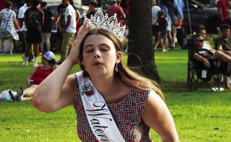 Kylee Heston, of Rush Springs, takes her turn at Pauls Valley’s Watermelon Seed Spitting Championship July 4. Heston, who also serves as the 2025 Rush Springs Watermelon Queen, placed third in the teen division of the Pauls Valley contest News Star photo by Chris Mackey