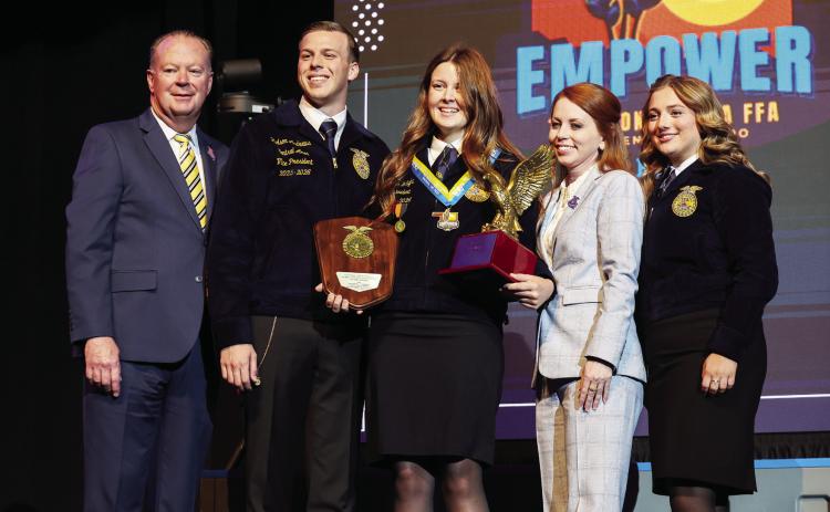 Faith Wright of Stratford FFA receives the State Star in Agricultural Placement at the State FFA Convention. From left, State Advisor Scott Nemechek, Central Area Vice-President Hudson Andrews, Wright, Executive Director of Oklahoma FFA Foundation Jacey Fye and State Reporter Darla Fesmire. Courtesy Photo