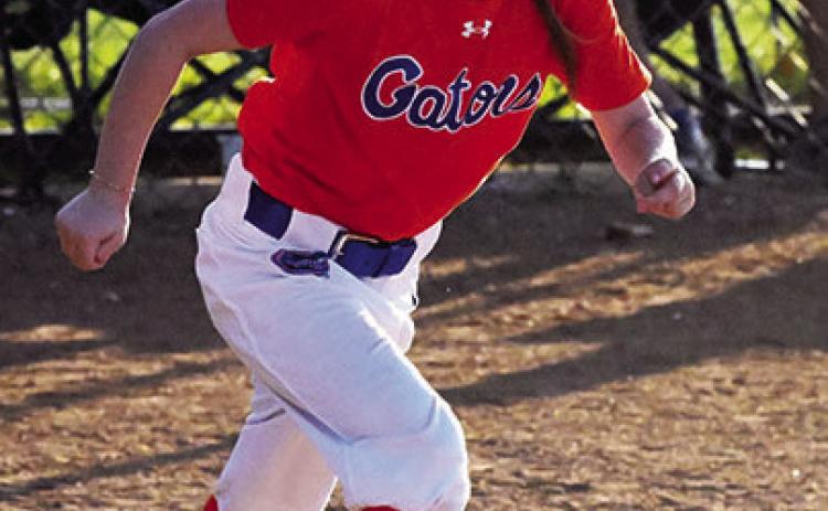 Emerson Miller of the Washita Gators takes off for first base. News Star photo by Don Coffey