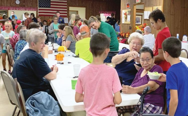 Under the supervision of Supt. Shelly Beach, Maysville 4-H and FFA members prepared and served lunch at the local senior citizens center last Thursday. The members not only prepared, cooked and served the meal, they entertained the group as well. News Star Staff Photo by Suzanne Mackey