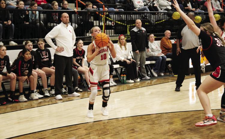 Lindsay’s Kamryn Bearden makes her three point shot count in last Friday’s game against Pauls Valley. The Leopardettes won a homecoming victory, defeating the Lady Panthers 39-22. Photo courtesy of Sheryl Kochert.