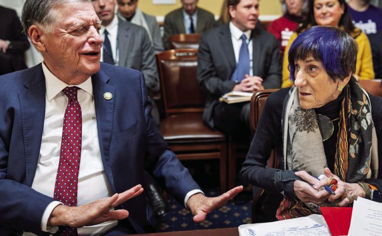 House Appropriations Chair Tom Cole, R-Okla., left, talks with Rep. Rosa DeLauro, D-Conn., the ranking member, right, as they go before the House Rules Committee to advance a federal funding package and prevent a prolonged partial government shutdown, at the Capitol in Washington, Monday, Feb. 2, 2026. (AP Photo/J. Scott Applewhite)