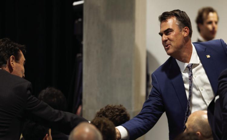 Gov. Kevin Stitt greets attendees of a Better Conversations Session on Aug. 14, 2024, at the Oklahoma National Memorial. Jake Ramsey/Oklahoma Watch