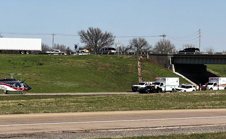 Northbound lanes of I-35 were closed near mile marker 70 for over an hour Monday afternoon as AirEvac crews prepared to transport two people injured in a multi-car collision.  News Star photo by Suzanne Mackey