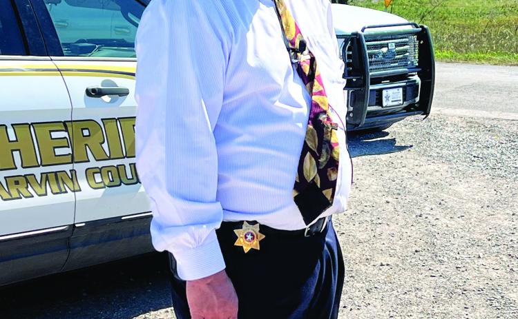 Garvin County Sheriff Jim Mullett gave an update regarding the discovery of a body believed to be fugitive Kameron Jenkins at a press conference near the crime scene Tuesday afternoon. News Star photo by Suzanne Mackey