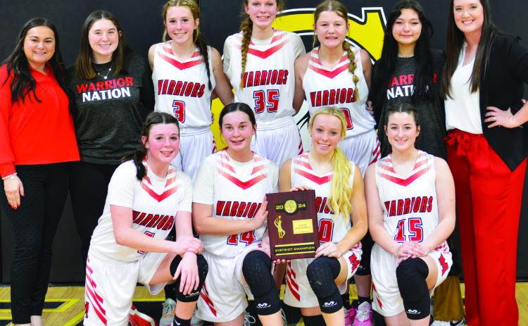 Maysville Lady Warriors pose to celebrate as 2024 Class B District 8 Champions. News Star photo by Denny Park