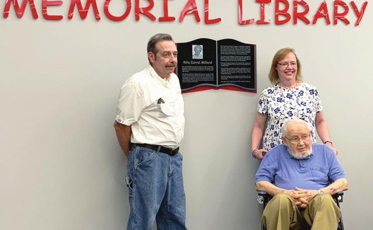 The Rita Millard Memorial Library at Pauls Valley Elementary School was formally dedicated in her honor last week. The library will allow Rita Millard's passion for encouraging young readers to continue to be realized for years to come. Pictured from left are her children, Duane Millard and Gayle Millard-Lord, and her husband, Harry Millard.