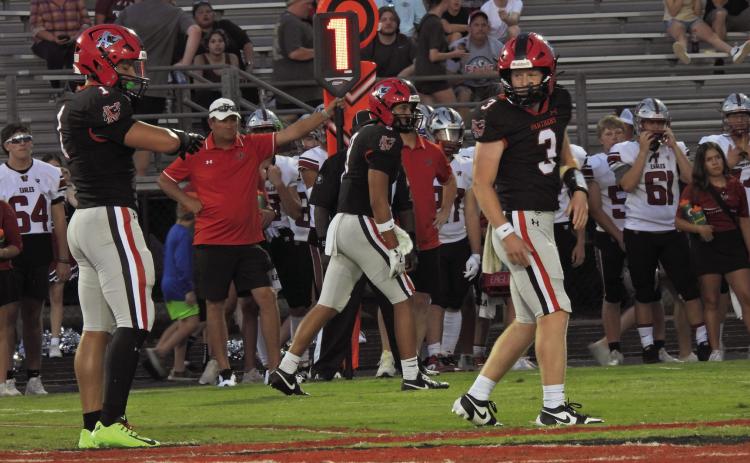 Pauls Valley’s Tanner Perry relays the play to running back Caden Knighten in the Panthers’ 19-6 win over class 4A Weatherford Friday. News Star photo by Chris Mackey