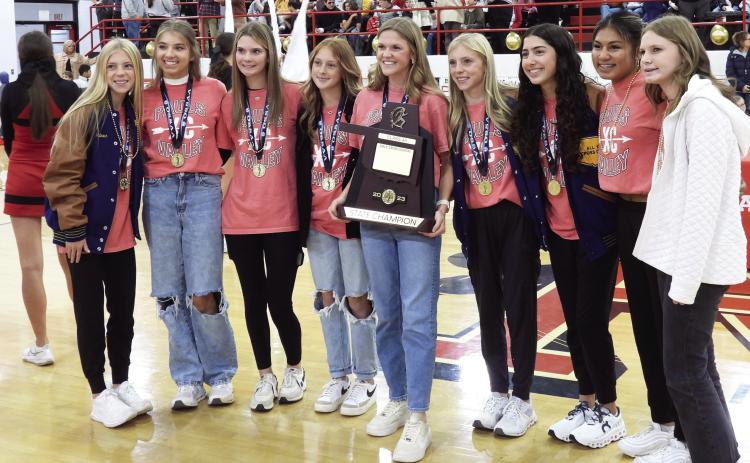 Pauls Valley’s cross country team with their State Championship trophy during a district-wide pep assembly Tuesday. Left to right: Kenzi Readnour, Amari English, Rachel Hamilton, Ella Miller, Laney English, Keira Readnour, Isabella Gutierrez, Katie Barahona and Kaitlin Rains. News Star photo by Chris Mackey