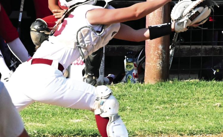 Wynnewood’s Ryann Nabors stretches for the foul ball during the Lady Savages’ 8-4 win over Davis Tuesday. Wynnewood defeated Sulphur 6-0 on Monday. The Lady Savages traveled to Stratford Thursday to play in the Stratford Junior High Tournament. News Star photo by Don Coffey