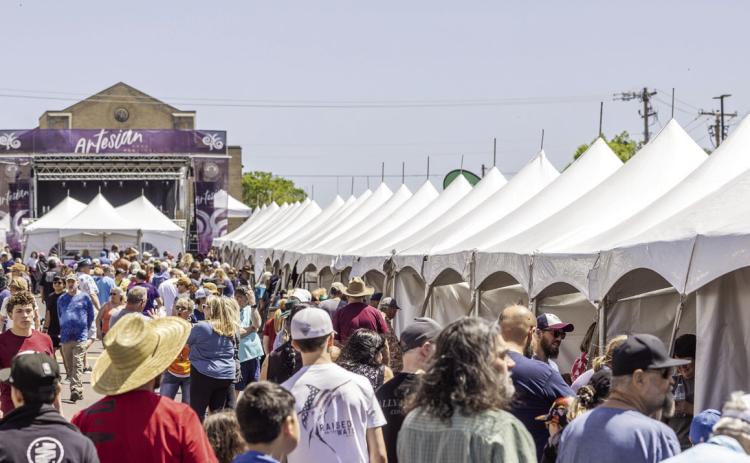 Art patrons at the 2024 Artesian Arts Festival. The 2025 Artesian Arts Festival is set June 7 at the Artesian Plaza, adjacent to the Artesian Hotel and Spa, 1001 W. First St., Sulphur. Courtesy photo
