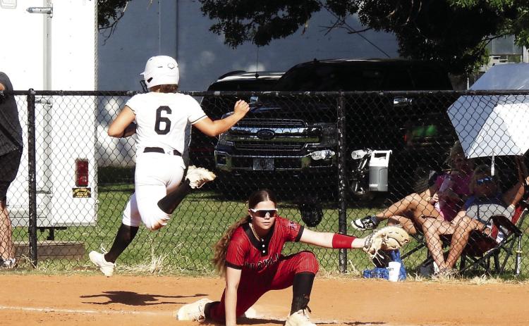 Lady Panther Daylee O’Bryant stretches out to take the catch for an out on a Marietta batter in the Mia Tapia Memorial Tournament last weekend. Pauls Valley beat Marietta 6-2 and Community Christian School 5-4. The Lady Panthers ended their tournament play with losses to tournament winner Kingfisher (5-2) and runner up Marlow (7-5). News Star photo by Chris Mackey