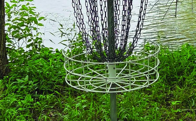Northshore Disc Golf Course, one of two in Elmore City, is the most technical course in the county. Hole 2 is surrounded by the lake on three sides. News Star Photo by Jennifer Lindsey