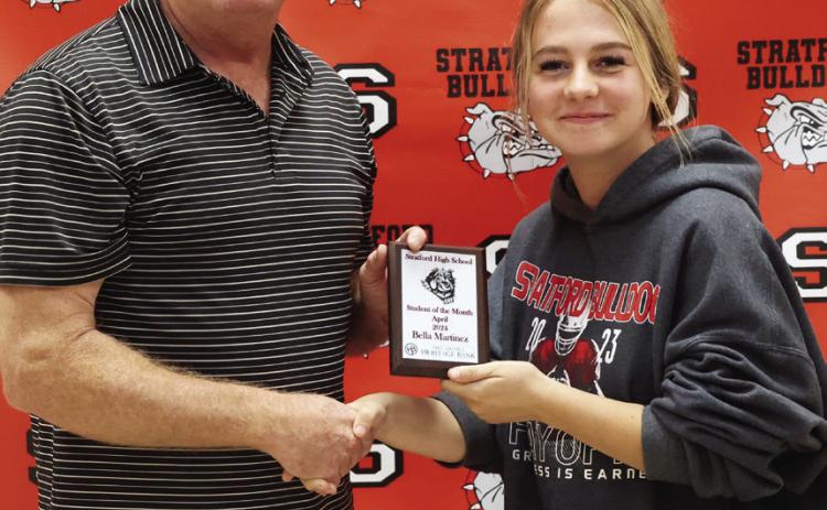 Stratford senior Bella Martinez receives the April student of the month award from High School Principal Paul Savage. Courtesy photo