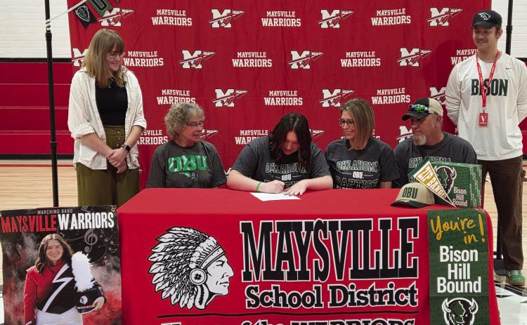 Pictured (l-r) Pride of Maysville Band Director Jaden Johnston, Karen Hinrichs, Paige Moore, Gwen Moore-Tillery, John Tillery and OBU Assistant Director of Athletic Bands Gavin Strickland. News Star photo by Jennifer Lindsey