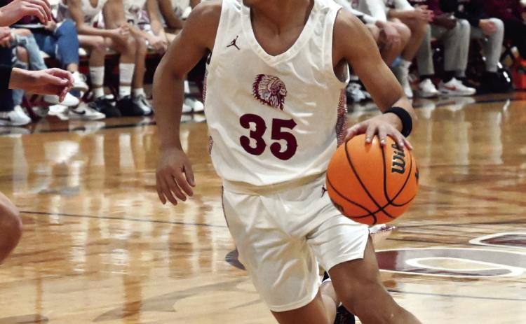 Savage Julian Givens playing at the Wynnewood Savage Invitational Tournament last weekend. News Star photo by Don Coffey