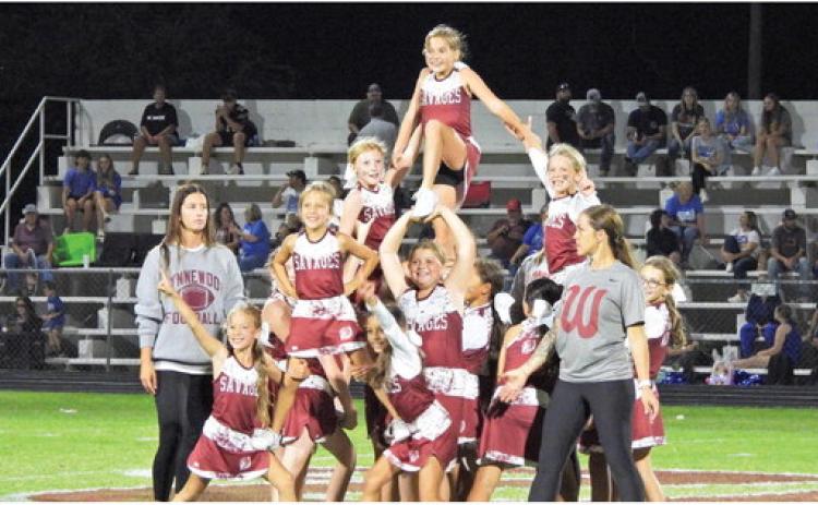The Wynnewood Youth League cheerleading squad took over the halftime show Friday night with some amazing stunts. News Star photo by Chris Mackey