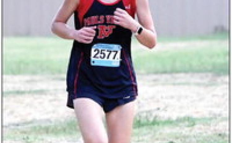 Panther freshman Rachel Hamilton helps bring the high school girls a first place finish with a mile time of 7:02. News Star photo by Don Coffey