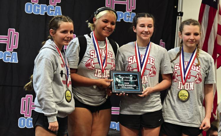 The Wynnewood junior high powerlifting team, from left, Ryann Nabors, Karistan Rushing, Parker Moore and Bailey Sexton, won State Runner-up honors. New Star photo by Don Coffey